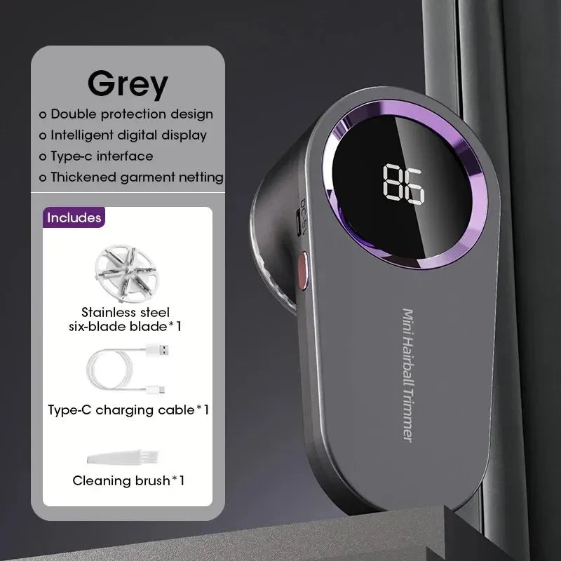 Gray mini hairball trimmer with digital display and charging cable on a dark background